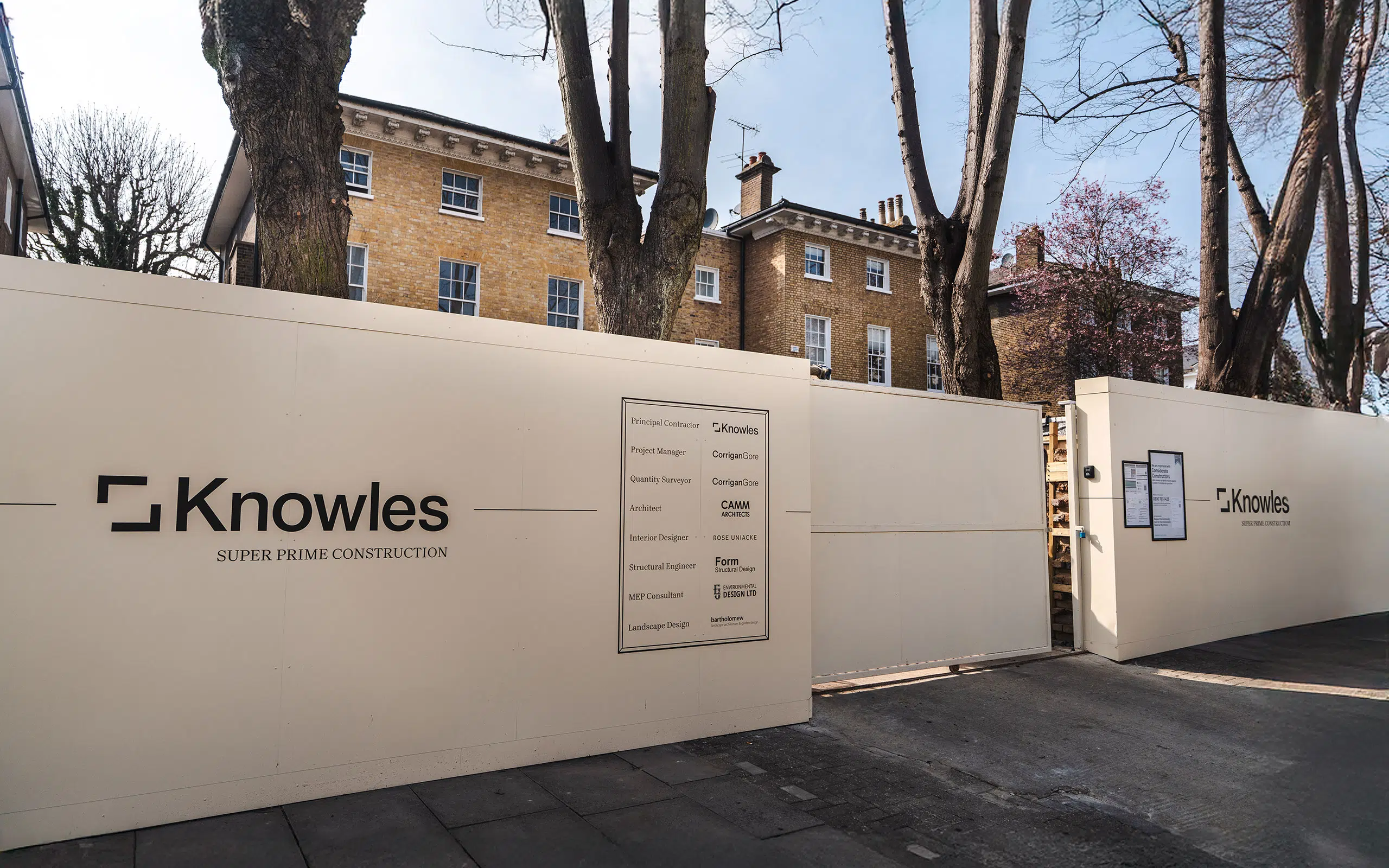 Knowles Construction hoarding in front of a super-prime construction project